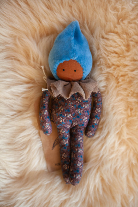 Studio Escargot Waldorf Doll on sheep skin rug