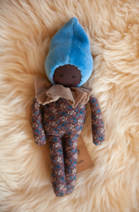 Studio Escargot Waldorf Doll on sheep skin rug